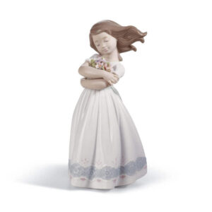 figurka porcelanowa dziewczynka z rozwianymi włosami i kwiatami Lladro